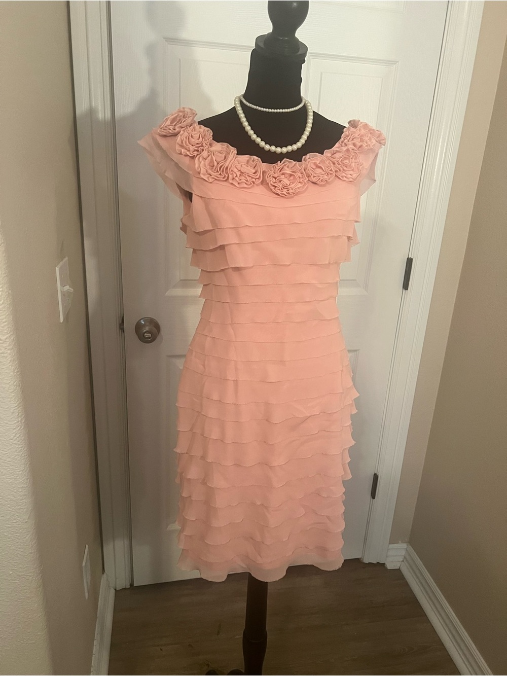 Floral pink evening dress with ruffles
